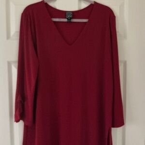 Clara Son Woo red top with some ruffle on the sleeves